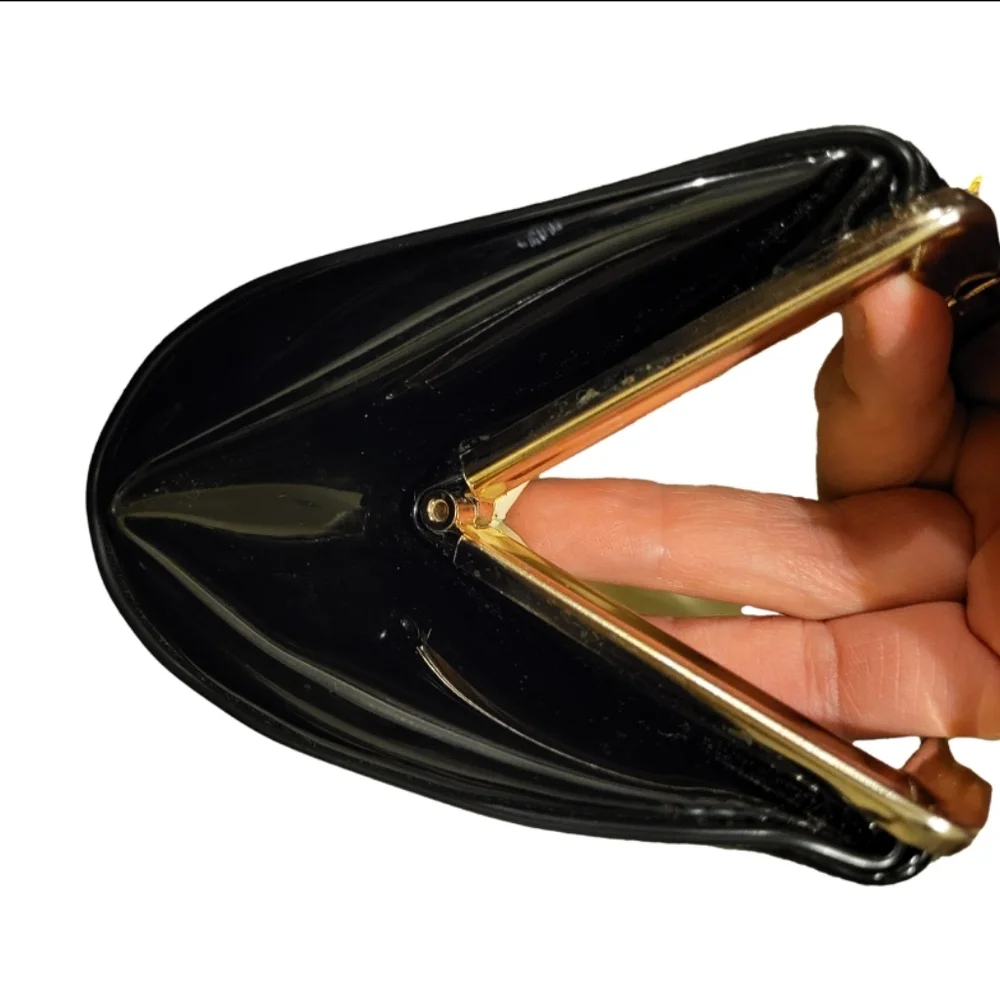 Elegant Black Clutch Bag with gold-tone hinged clasp and gold chain